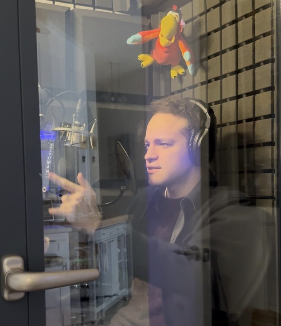 Alexander Steinberg, co-founder of Wild Comet Media, voicing Spider-Man in the recording booth for Today in Marvel History